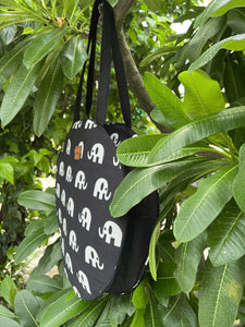 Sooti Round Quirky Tote Bags side view, in cotton for those casual times and vacation days. Spacious enough to keep all your belongings. Handcrafted with love