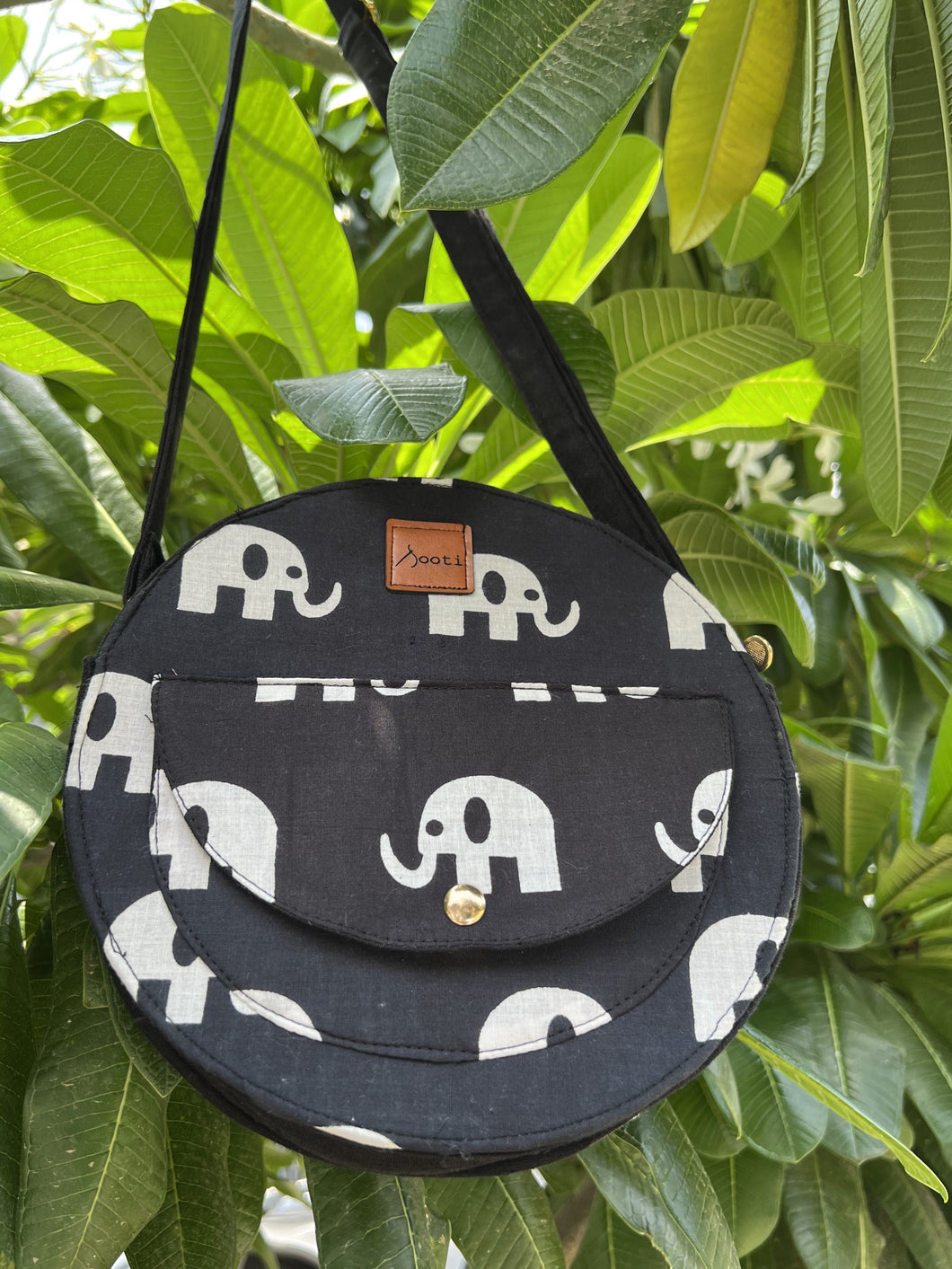 Round Sling Bag for casual outings, perfect for quirky lovers.