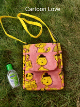 Load image into Gallery viewer, kindle sleevs cum sling bag - cartoon quirky print