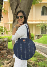 Load image into Gallery viewer, Round Ikat Tote Bags for those casual times and vacation days. Spacious enough to keep all your belongings. Reference image for the size