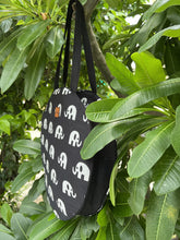 Load image into Gallery viewer, Sooti Round Quirky Tote Bags side view, in cotton for those casual times and vacation days. Spacious enough to keep all your belongings. Handcrafted with love