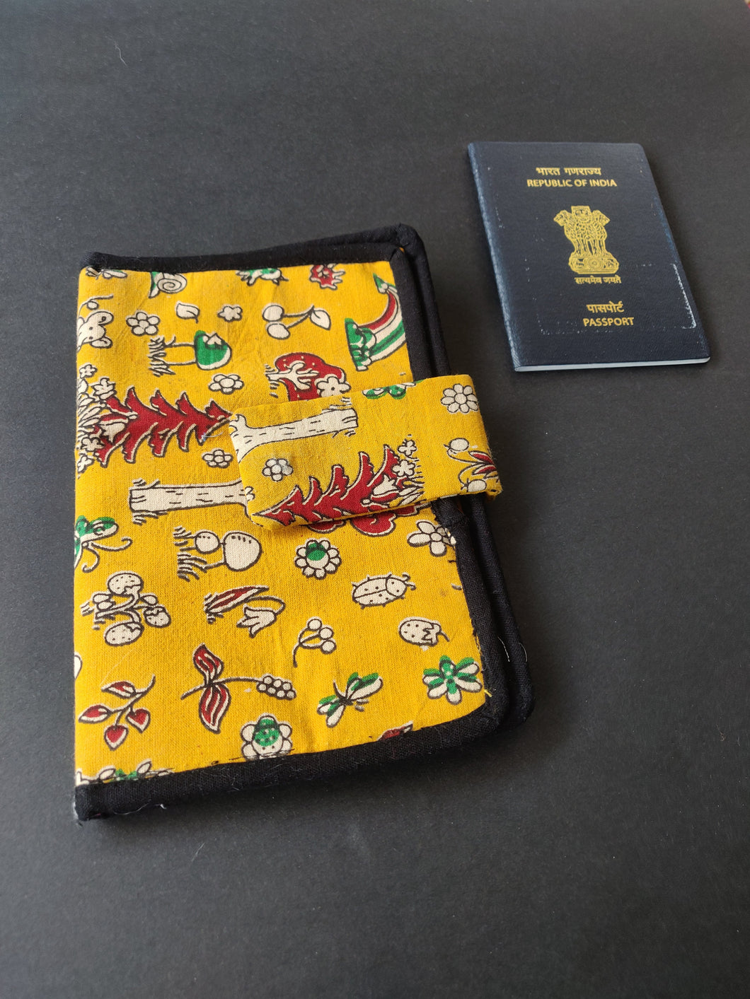 Sooti Passport wallet can hold 2 passports and few frequent flyer / ID Cards.