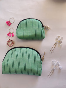 Sooti multipurpose travel organizer pouches for keeping make-up, medicines, electronics, toiletries, etc.  Comes with 2 pouches of different sizes. Large and small in light green color. Priced at Rs. 499.