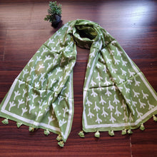 Load image into Gallery viewer, Green Scarf In Cotton, The fabric is soft and airy, perfect as a summer scarf. The length is just perfect to try various styles without getting overwhelmed about managing it.