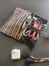 Load image into Gallery viewer, Sooti charger wrap can accommodate three mobile chargers. One can wrap earphones too in the band which is elasticated.  Sooti handmade charger wrap is a perfect travel accessory to keep belongings of your gadgets in one place.